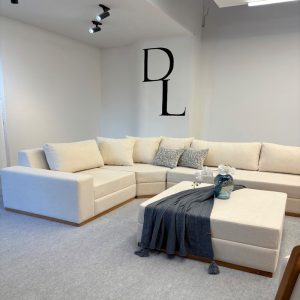 مبل ال نه نفره با روکش پارچه و پایه چوب مدل کاترین به همراه 7 کوسن